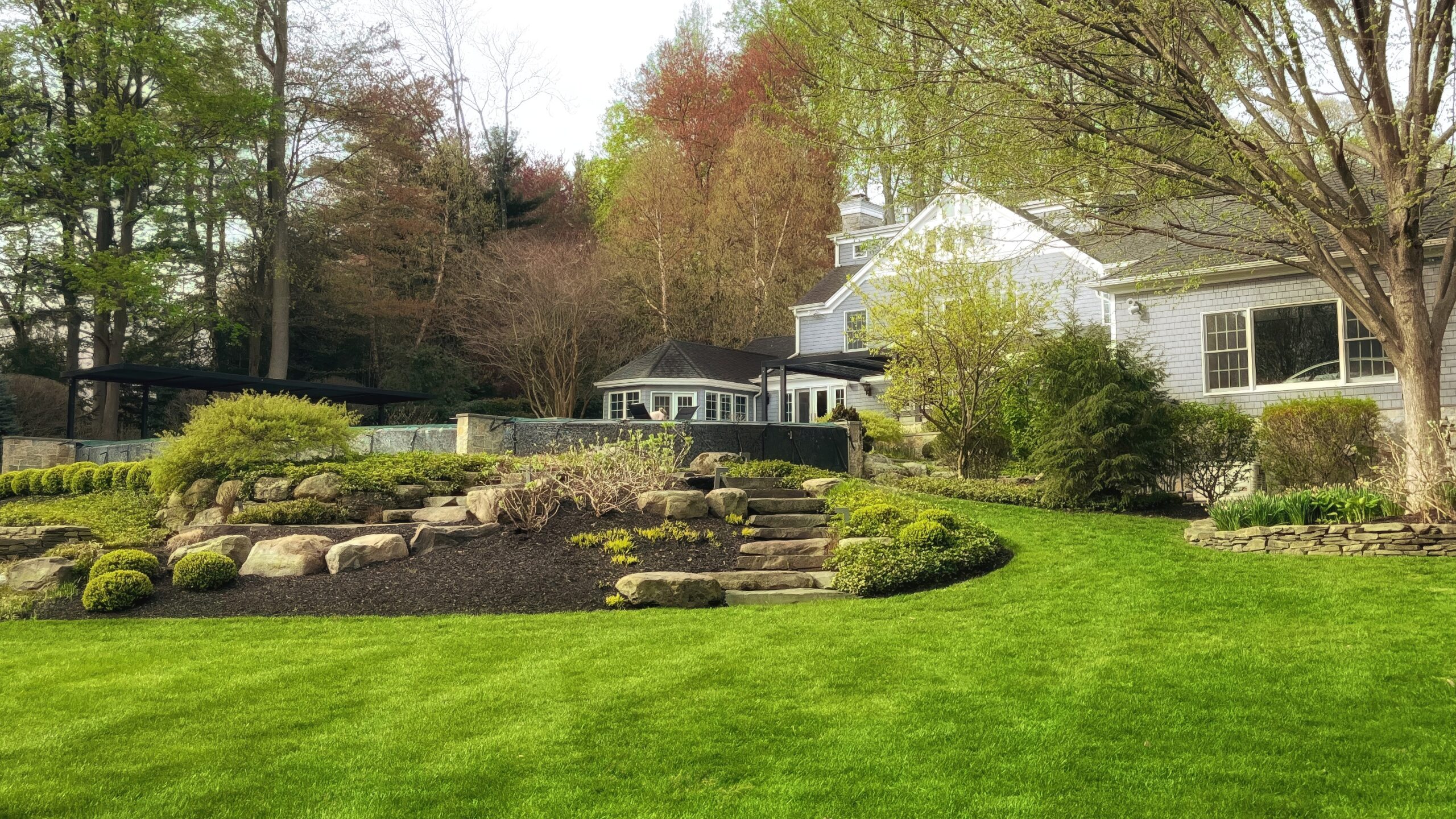 Garden bed installation at residential property in Monmouth County by Green Horizon Landscape.