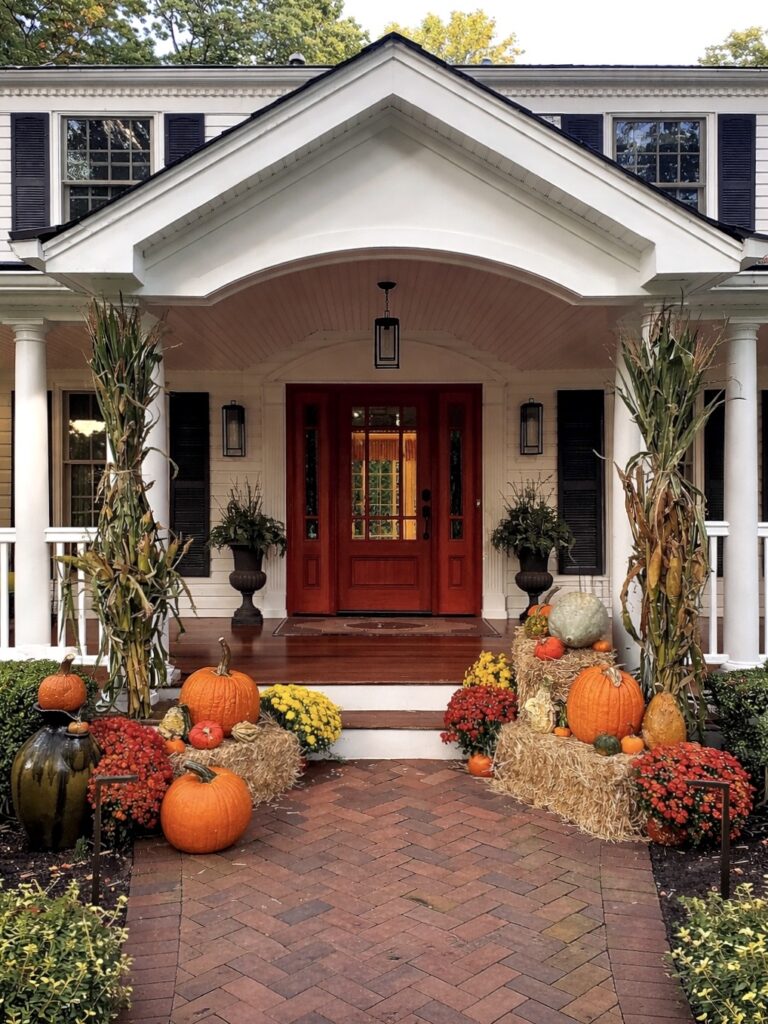 Fall front entry display with pumpkins and seasonal decorations in Middletown, NJ