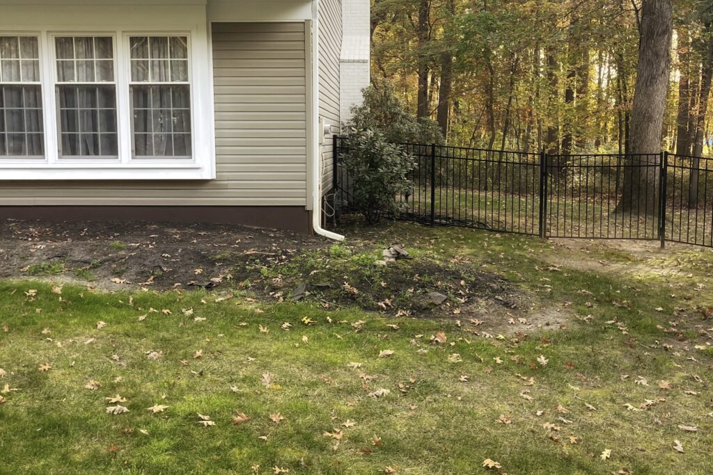 Front yard landscape before stone structure and hardscape work