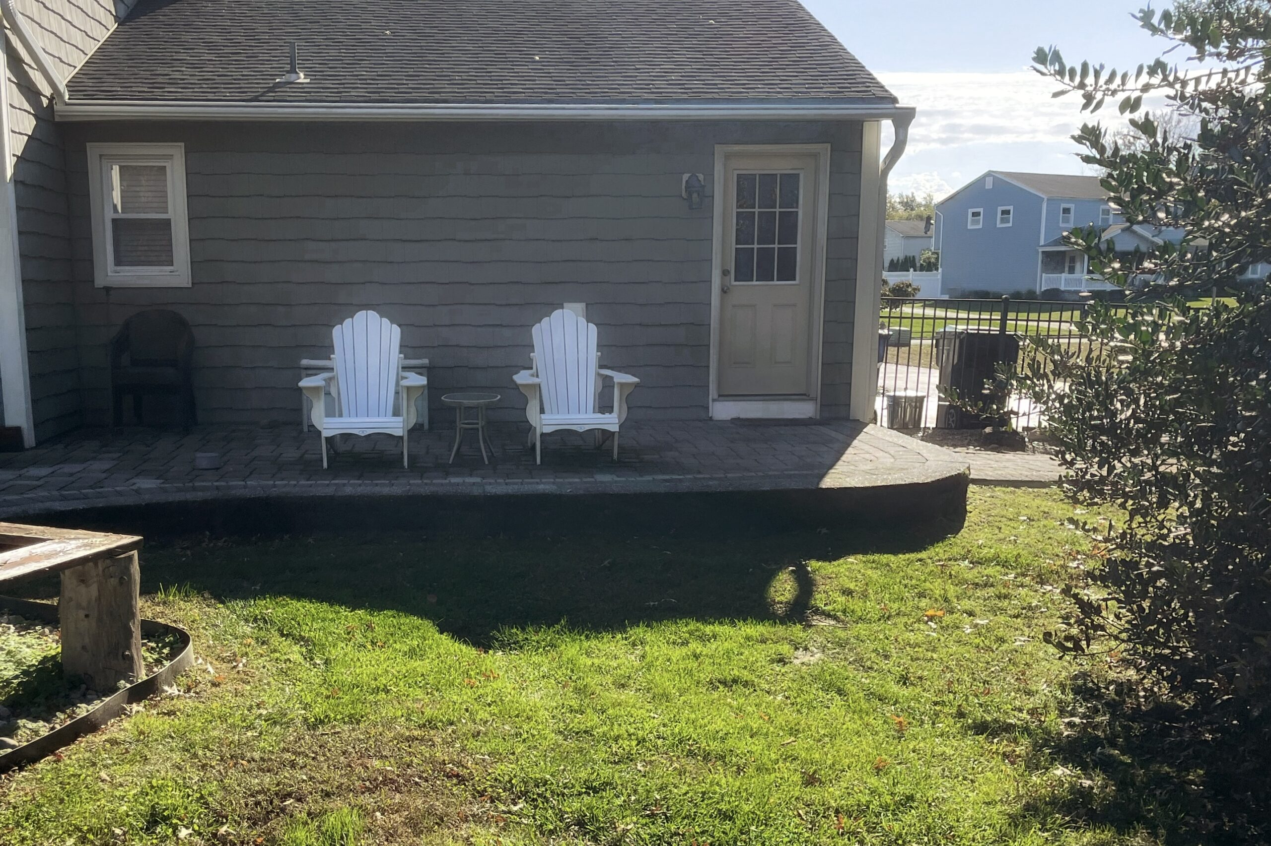 Backyard before stone patio construction and hardscape installation